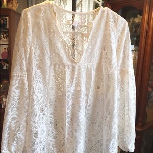 Lacy, long sleeve size small, looks like sm/med